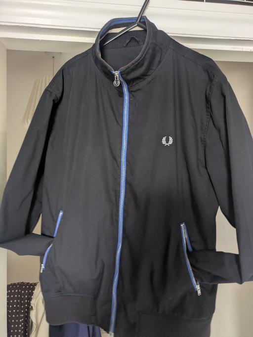  — Fred Perry track jacket.
