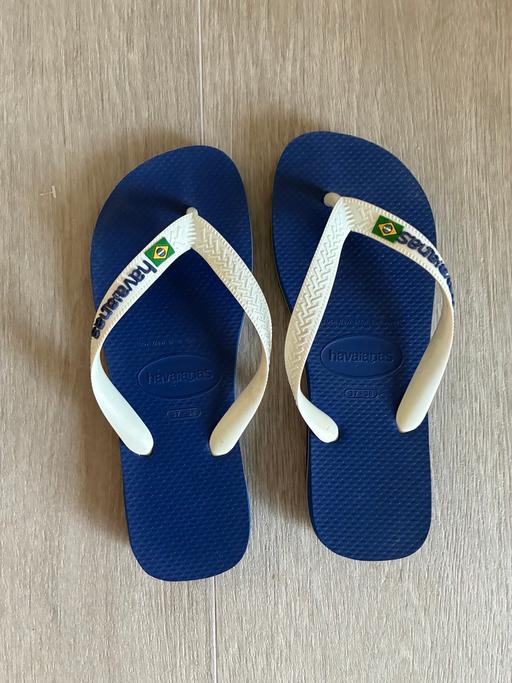  — Men’s Havaianas Flip Flops (Blue, Size; 4/5)