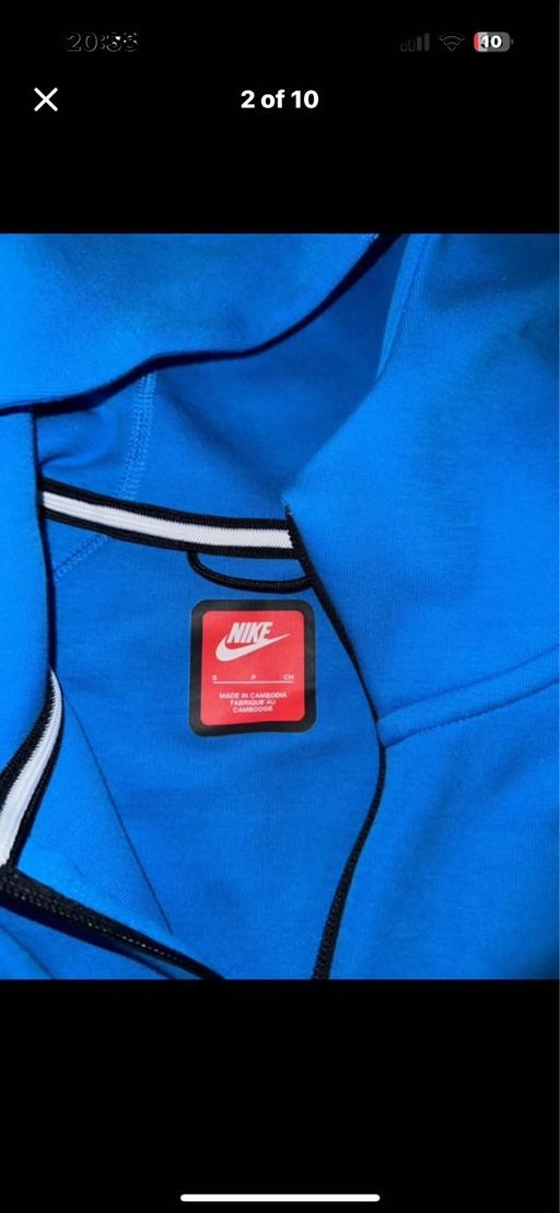  — Nike tech blue