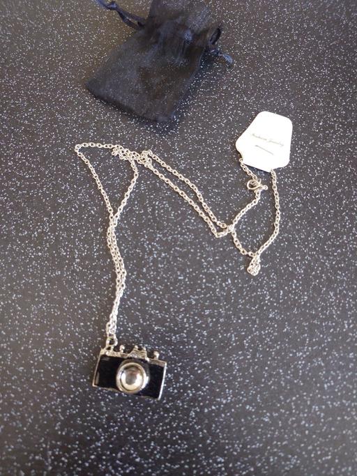  — Women's camera necklace