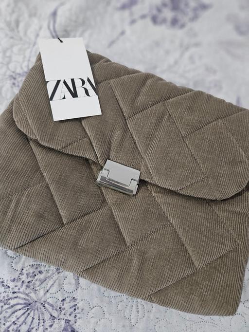  — Handbag
