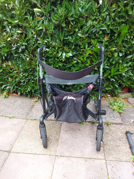  — Walker with seat