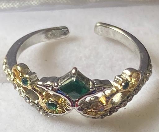  — Ladies unmarked silver emerald & c.z ring.