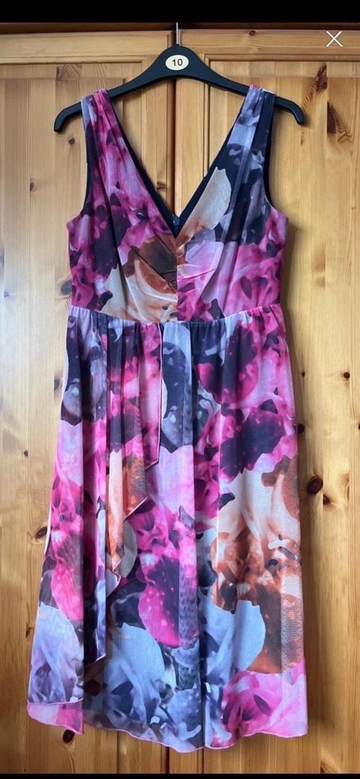  — Next Dress Size 10