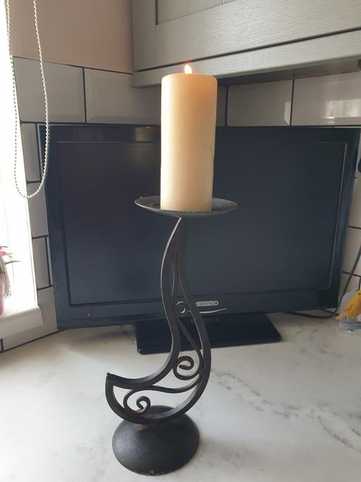  — Iron candle stand with candle