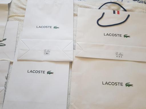  — 8x Lacoste paper bags (empty)