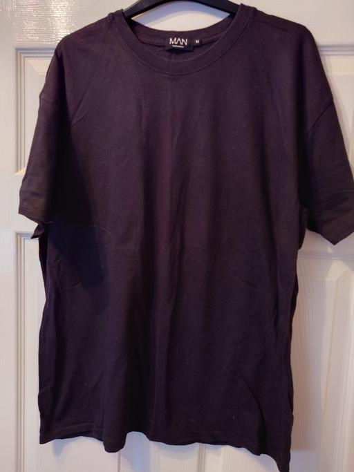  — Mens black top size M