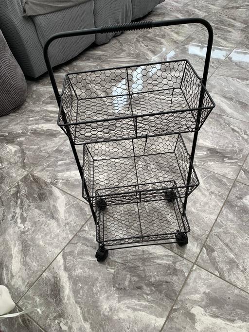  — Black wired three shelf food storage baskets