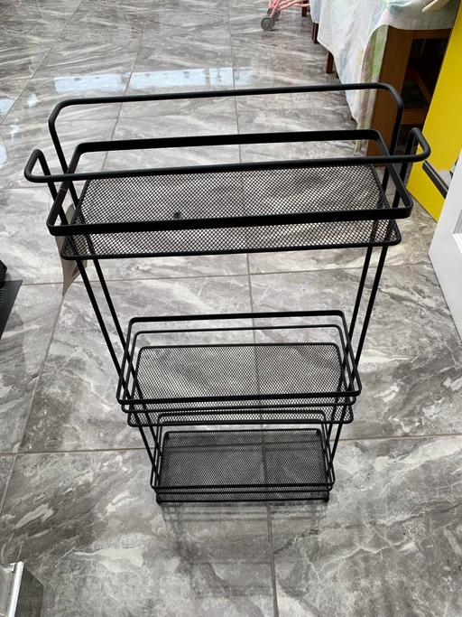  — Black caddy display unit storage shelves rack