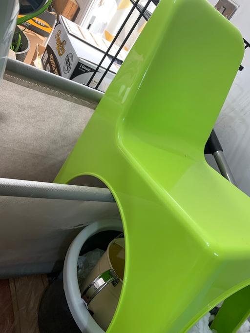  — Bright lime green plastic child kid chairseat