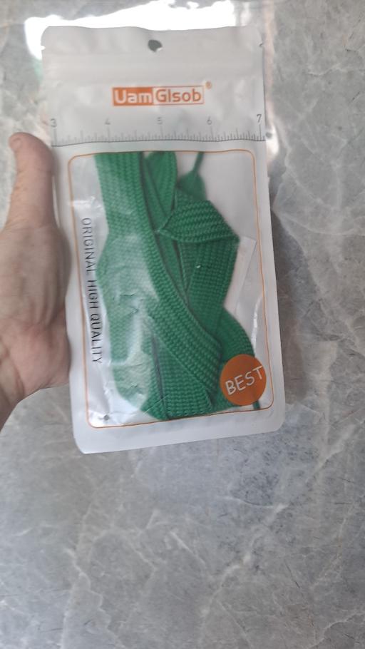  — Green laces