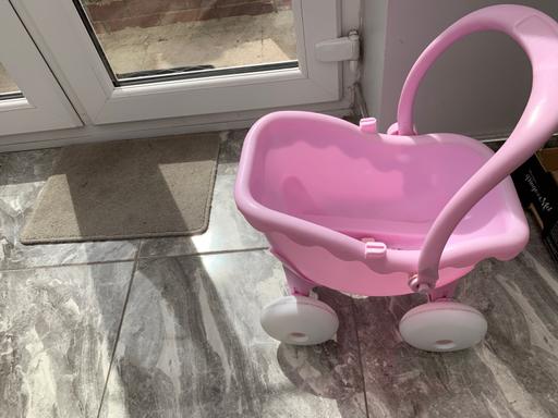  — Pink plastic child’s kids baby doll push pram