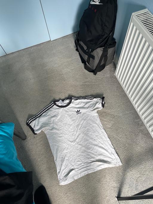  — Adidas shirt
