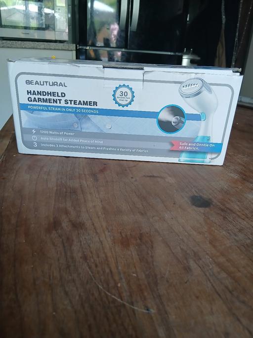  — beautural handheld steamer  brand new