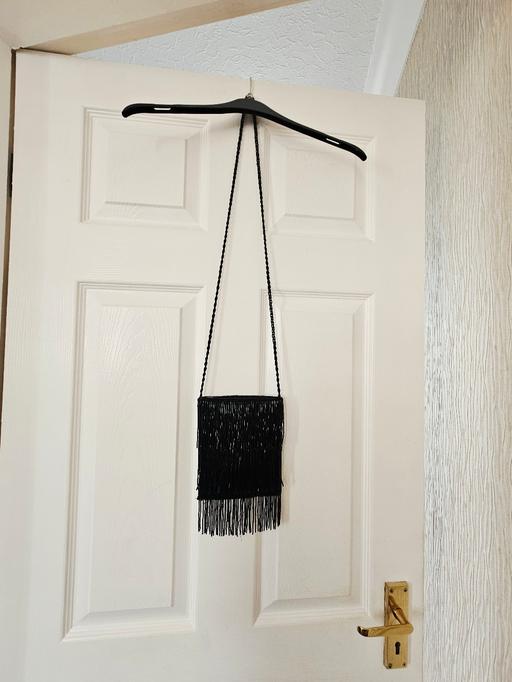  — Beaded bag.