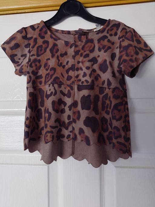  — Girls leopard print top size 4-5 years