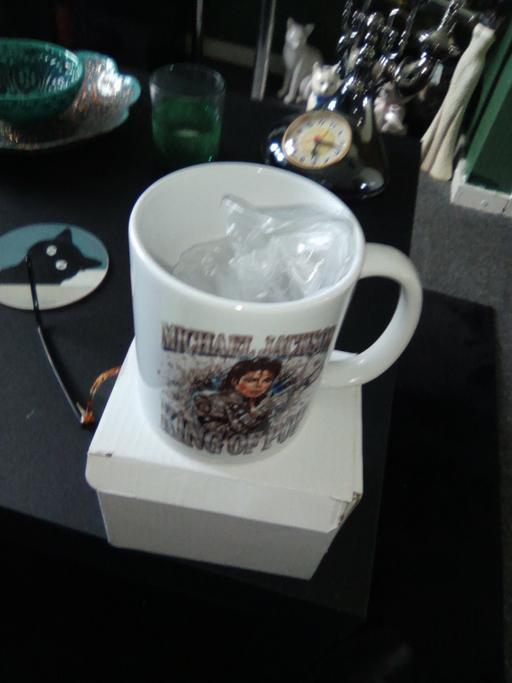  — cup