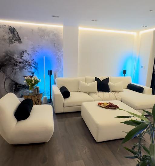  — Contemporary white L shape sofa with ottoman