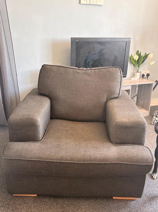  — Singular grey chair