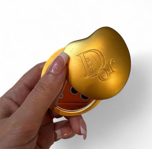  — Christian Dior gold compact mirror