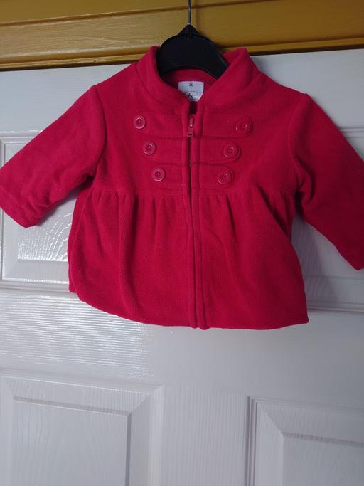  — Baby girls red fleece jacket size 0-3 months