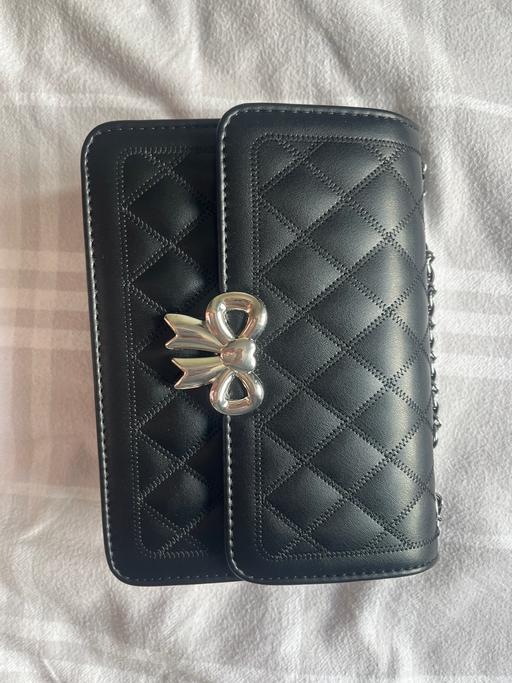  — Black handbag
