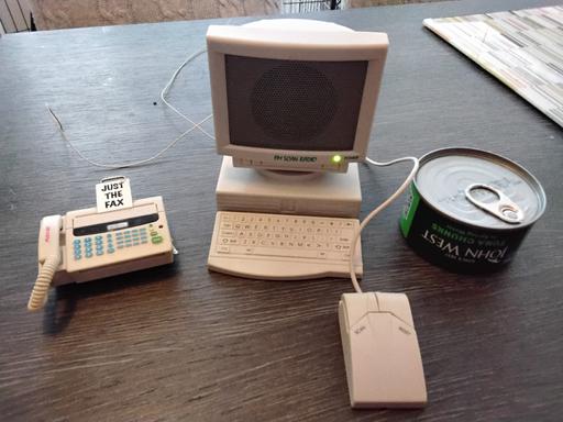  — 1990s miniature computer shape fm radio