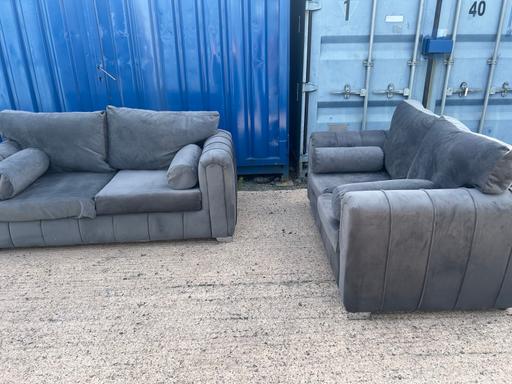  — Grey plush sofas