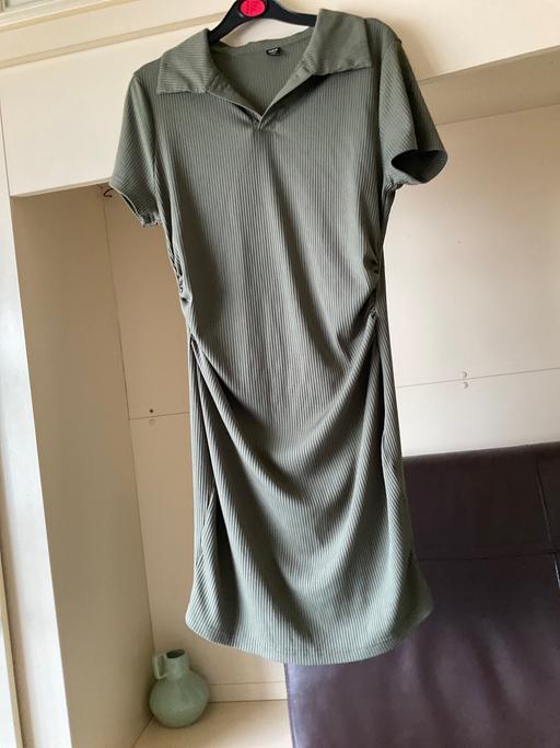  — Dress