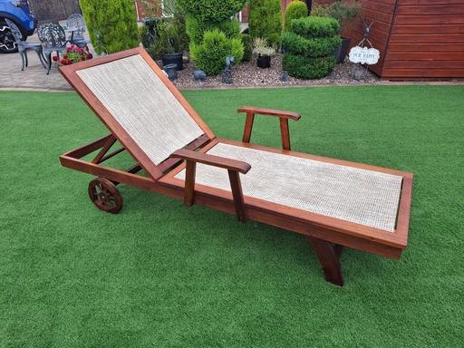  — solid wood lounger plus 2padded cushions