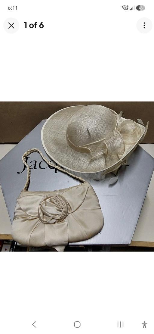  — woman's wedding hat and bag