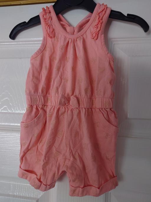  — Baby girls pink playsuit size upto 3 months