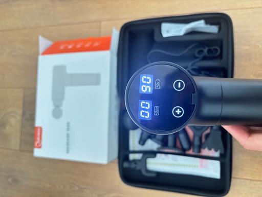  — Massage gun with zipped case
