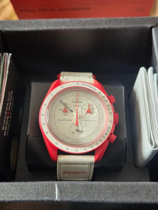  — swatch x omega watch like new