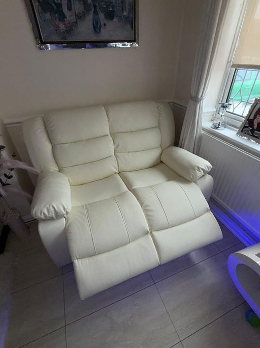 — White roma leather sofa