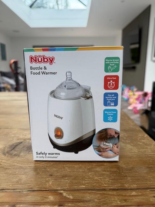  — Brand new in box Nuby Bottle and Food warmer