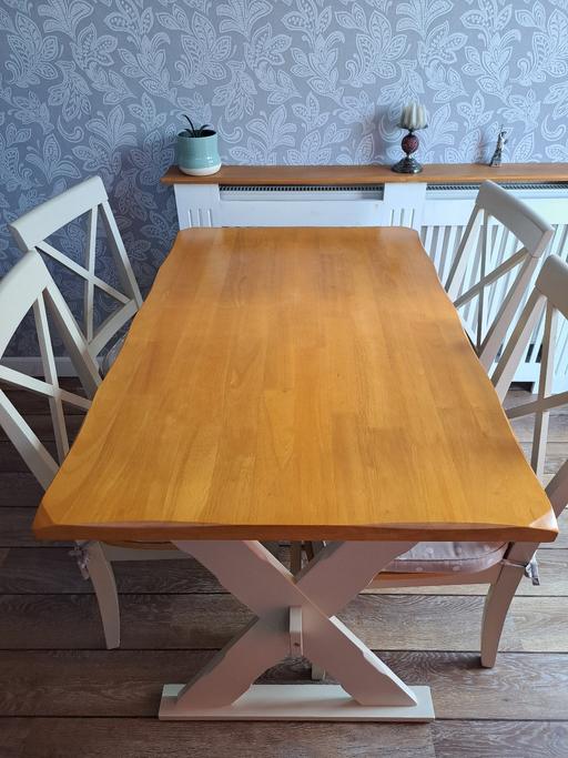  — Solid oak dining table and 4 chairs