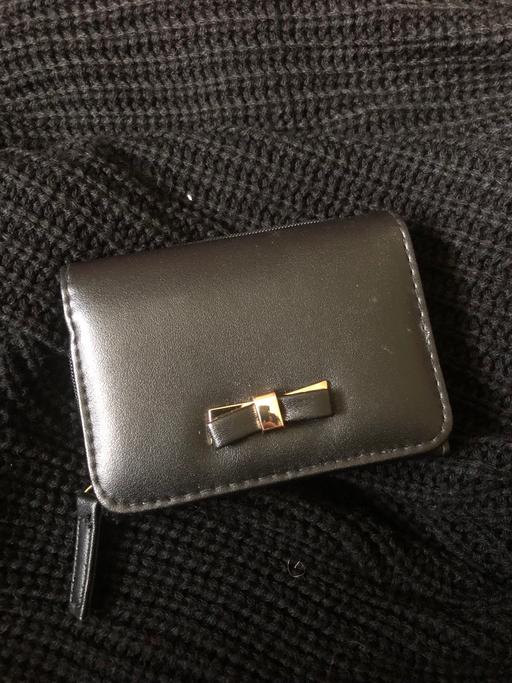  — Purse