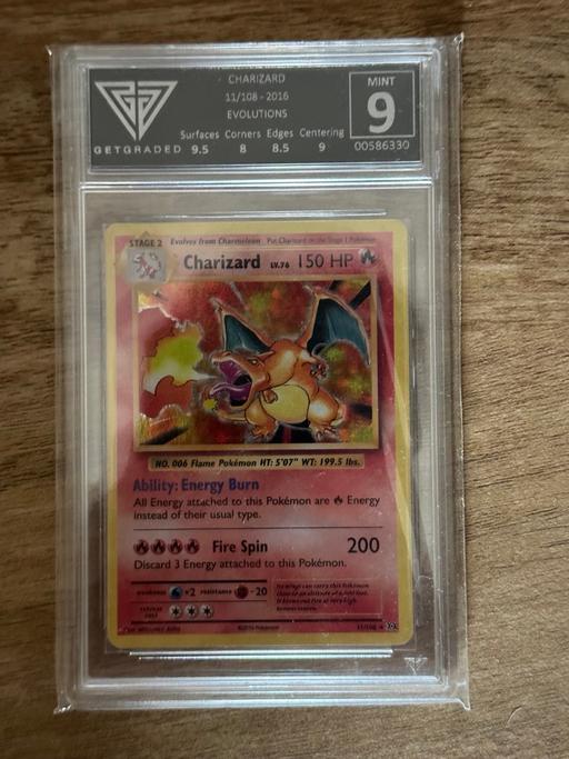  — Charizard 11/108 - Graded 9