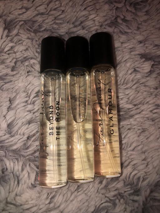  — Avon purse perfumes