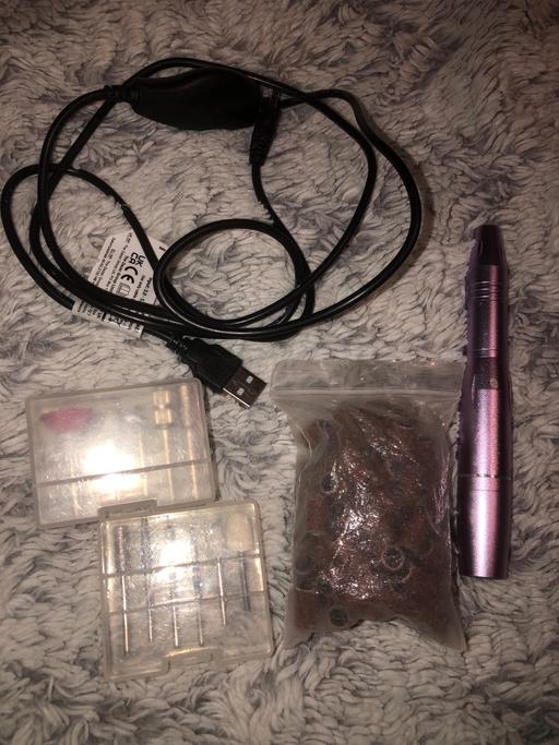  — Electric nail file
