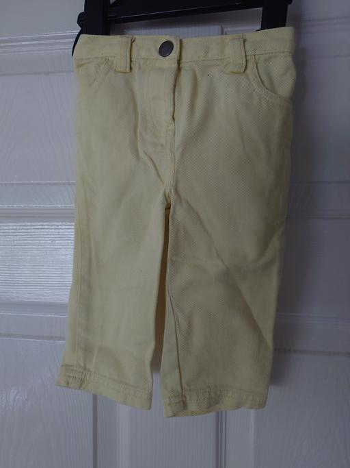 — Baby girls yellow jeans size 6-9 months