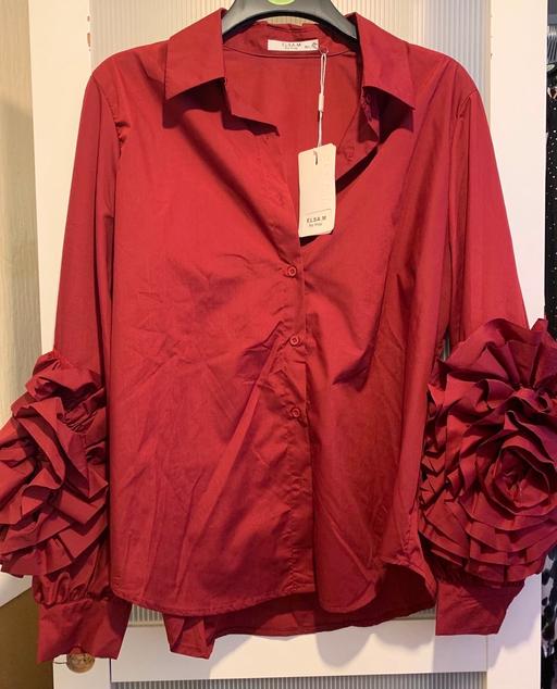 — Maroon Shirt