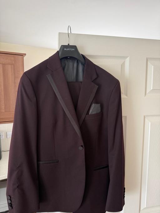  — Two piece maroon suit