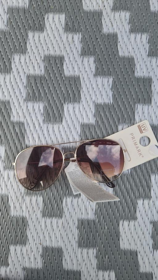  — Sun glasses