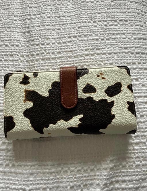  — purse