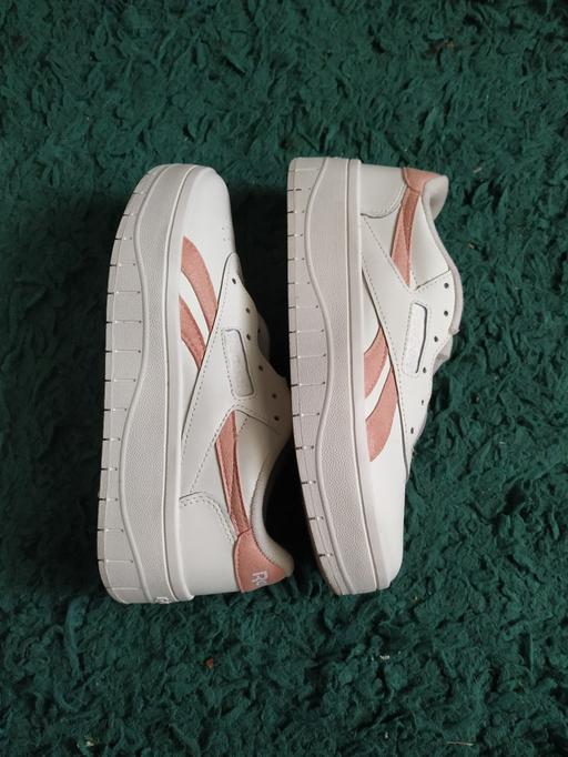  — ladies pink and white Reebok trainers