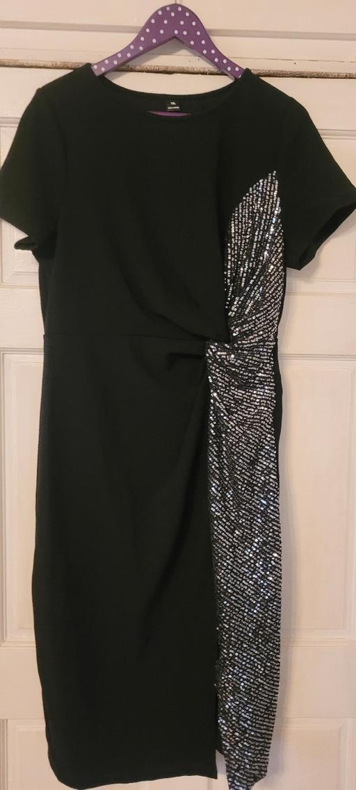  — womans dress siz 1XL