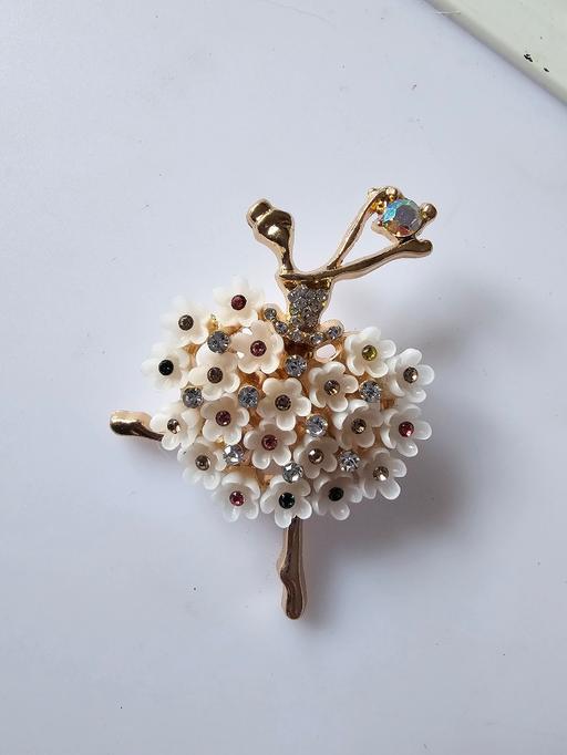  — ladies brooch