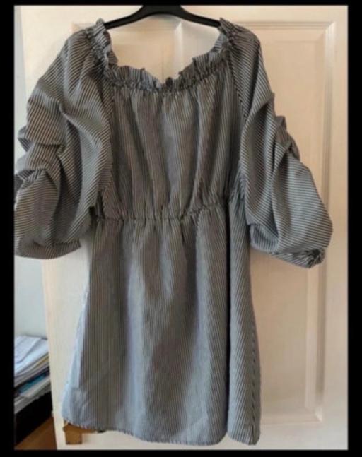  — Tunic